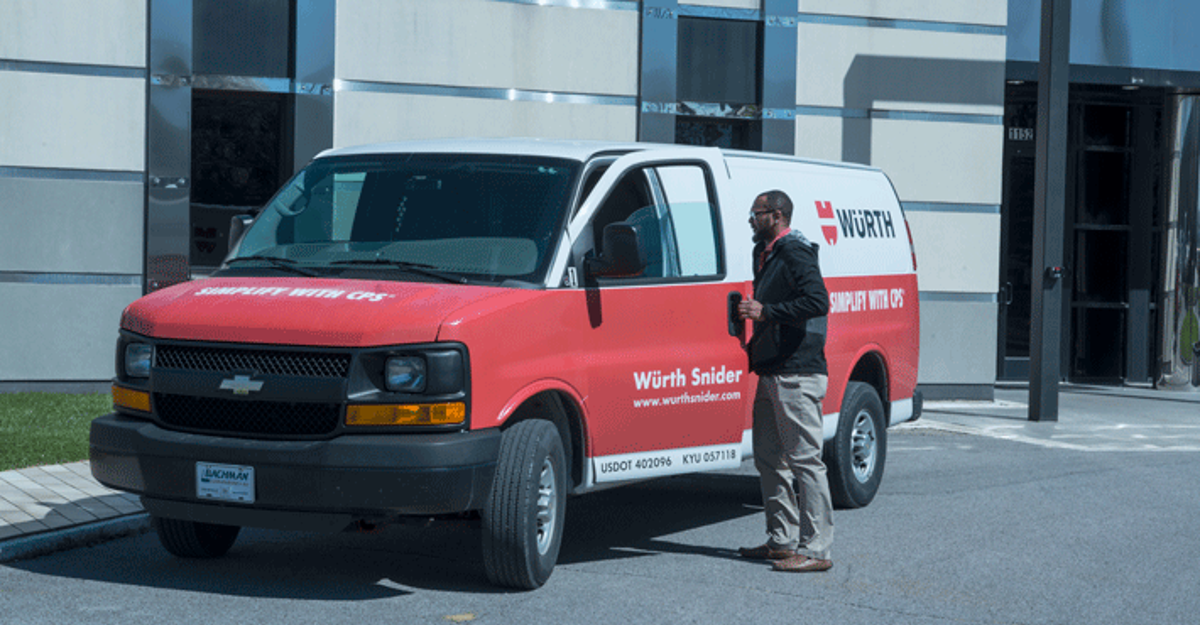 Red and White Würth Snider Van with Employee Getting In Red and White Würth Snider Van with Employee Getting In