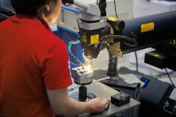 Employee Controlling Fastener Machine New Product Design